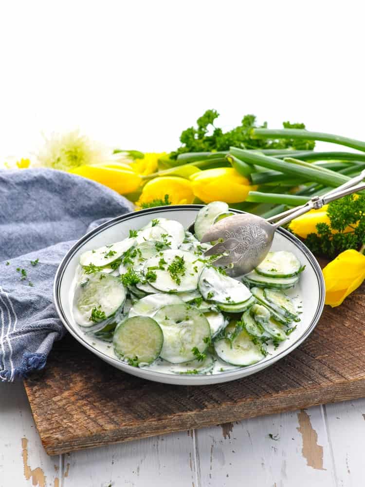 Bowl of healthy vegetarian side dish -- Creamy Cucumber Salad!