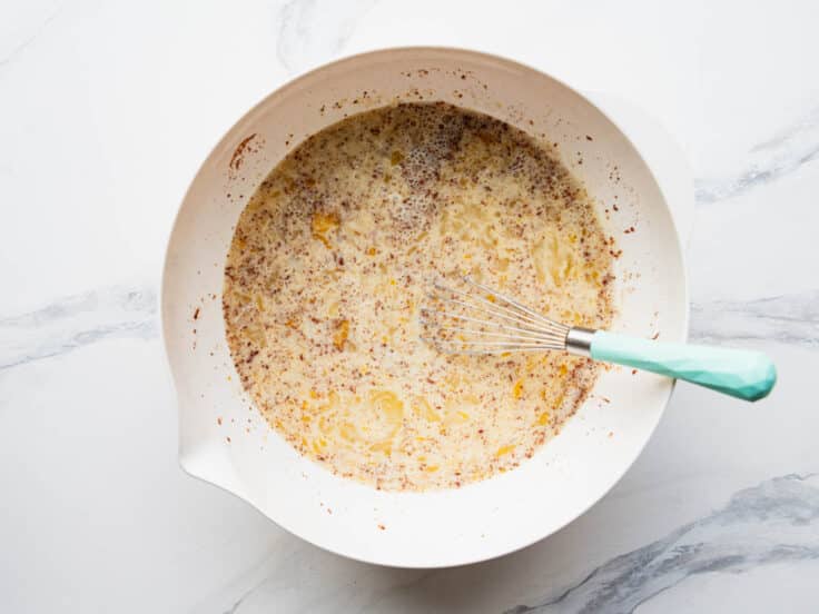 Whisking the custard for French toast casserole.