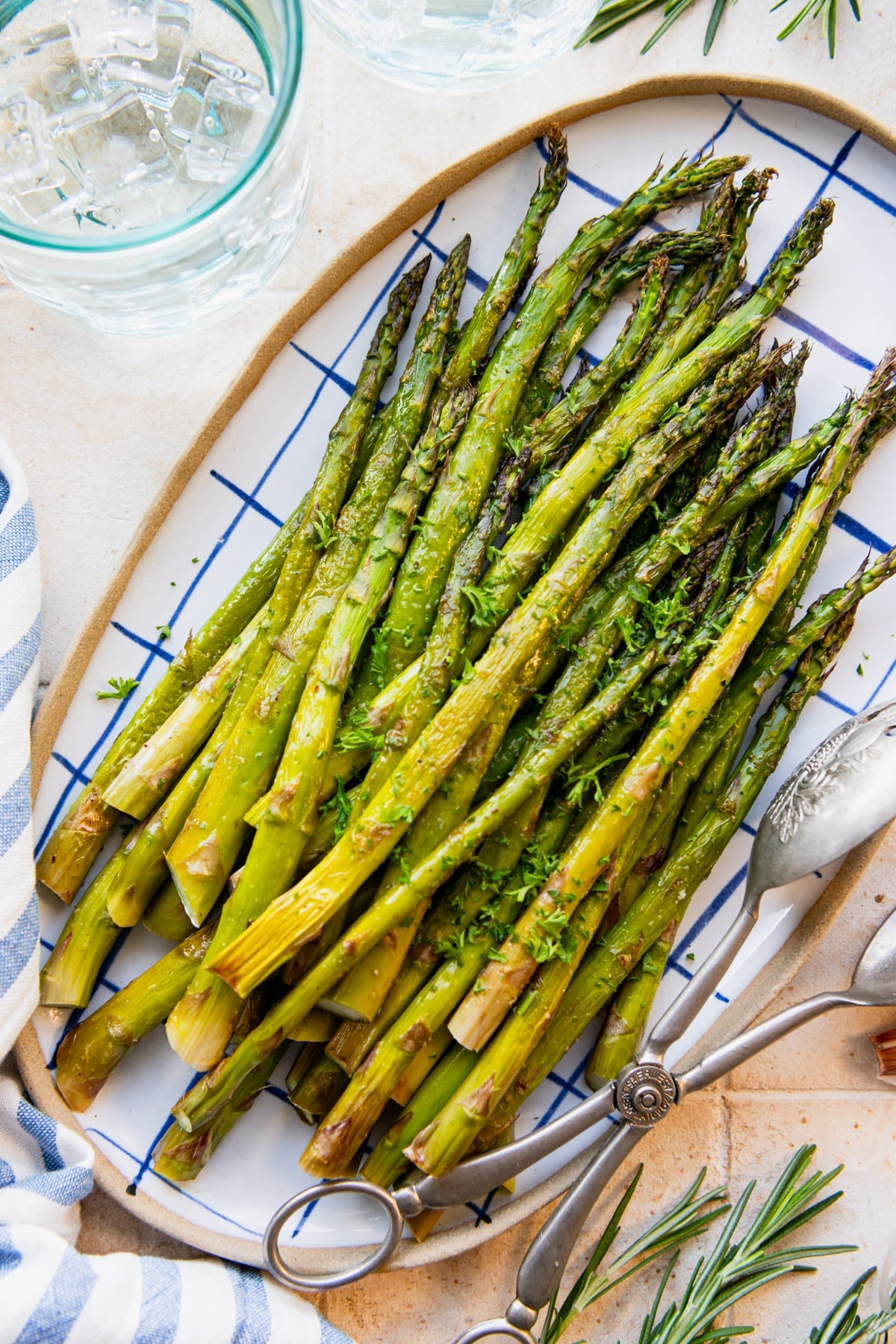 Close overhead shot of oven roasted asparagus on a platter.