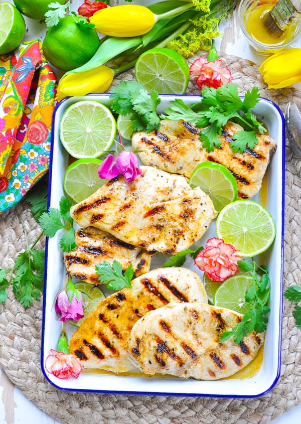 Tray of grilled Mojo Chicken breasts.