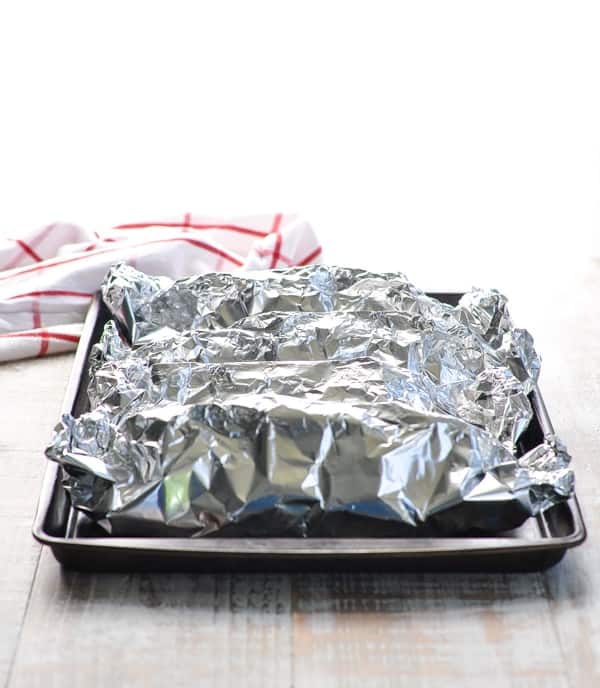 Tray of foil pack meals for the oven or grill.