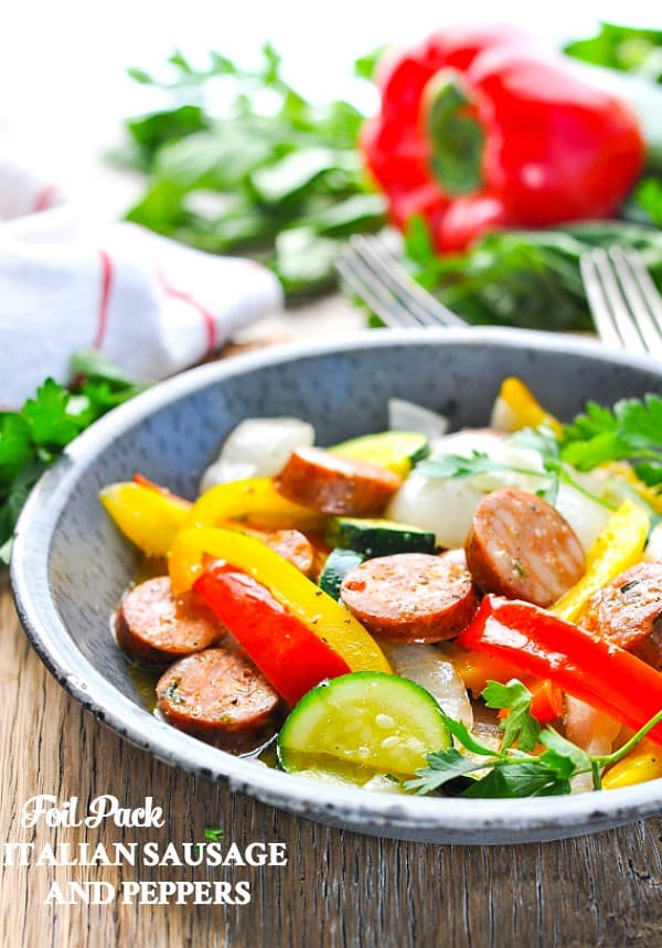 An easy dinner recipe of Italian Sausage and Peppers cooked in foil packets.