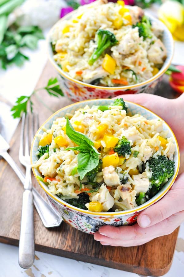 A creamy and cheesy one pot chicken and rice with vegetables is a family friendly easy dinner for busy nights!