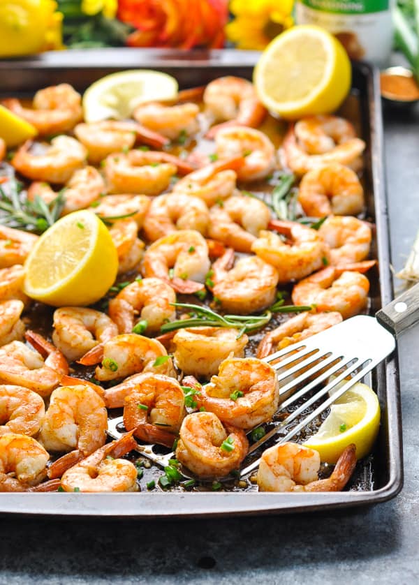Barbecue shrimp is a healthy dinner recipe that cooks on one sheet pan in the oven