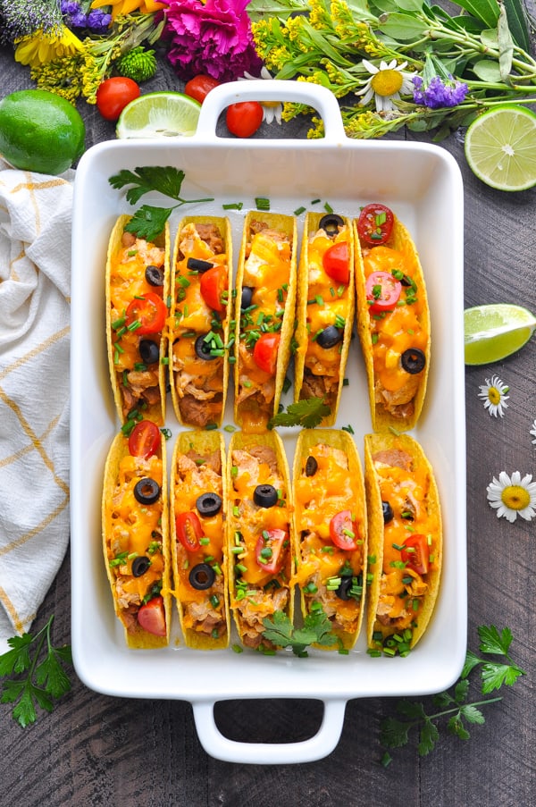 These Dump and Bake Chicken Tacos are an easy dinner recipe that's ready in 20 minutes!