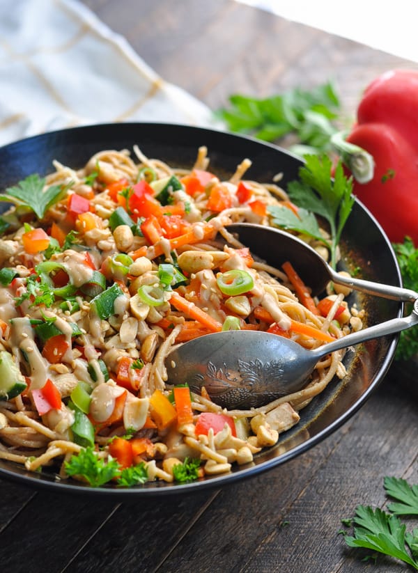 So many fresh vegetables complete this easy dish of Peanut Sesame Noodles with chicken.