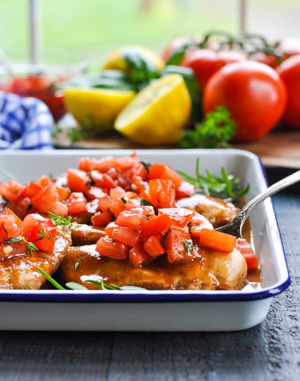 Easy Bruschetta chicken topped with a tomato and basil topping.