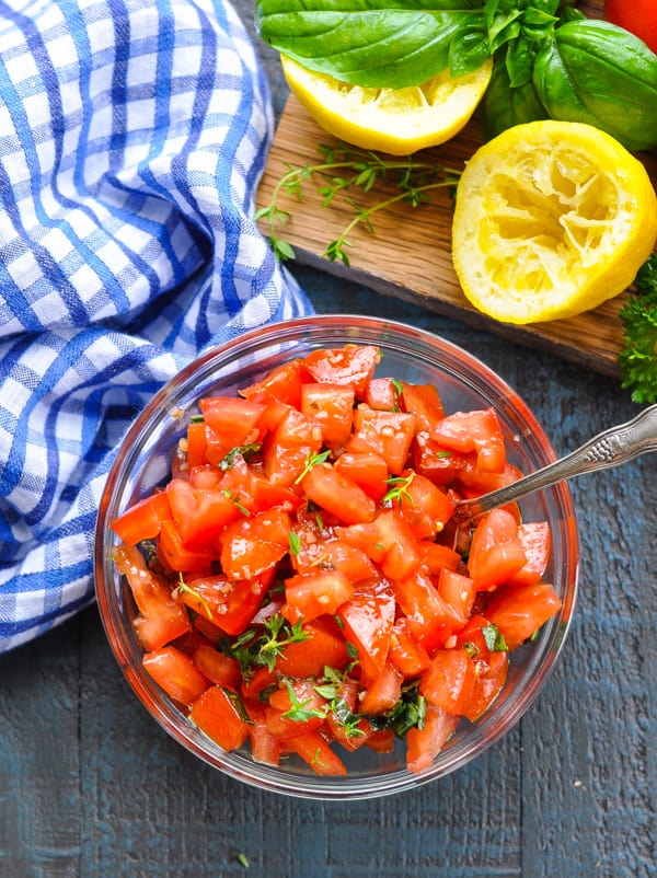 Bowl of fresh tomatoes for a healthy dinner called Bruschetta Chicken
