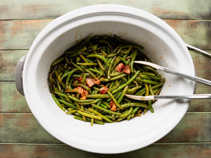 Finished green beans in a slow cooker.