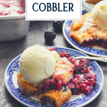 Plate of easy old fashioned blackberry cobbler with text title overlay