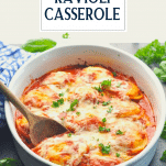 Front shot of baked ravioli in a white dish with text title overlay