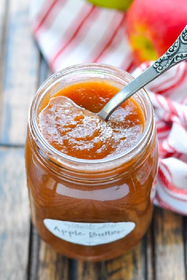 Spoon in a jar of homemade crock pot apple butter