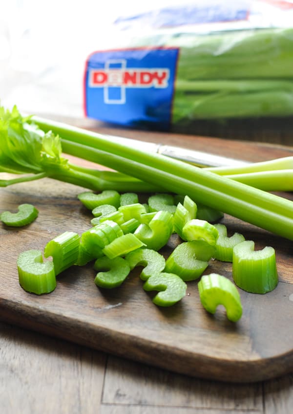 Chopped celery on a cutting board