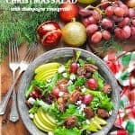 Christmas Salad with pomegranate and champagne vinaigrette with text overlay