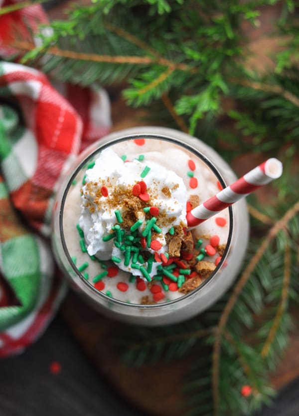 Overhead image of gingerbread cookie protein smoothie with toppings