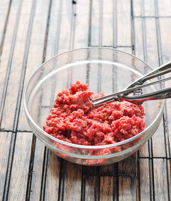 Beef mixture with scoop for Italian meatballs