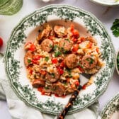 Square overhead shot of a bowl of Italian sausage and rice casserole.