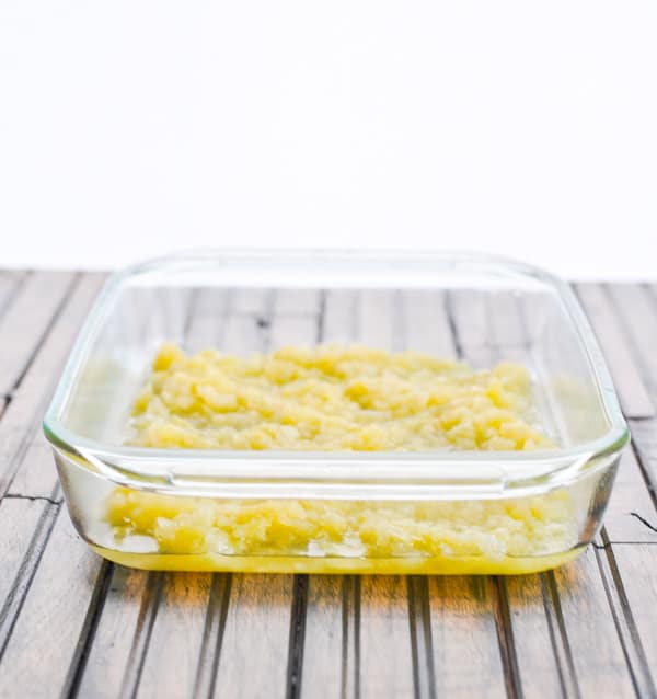 Canned crushed pineapple spread in glass baking dish