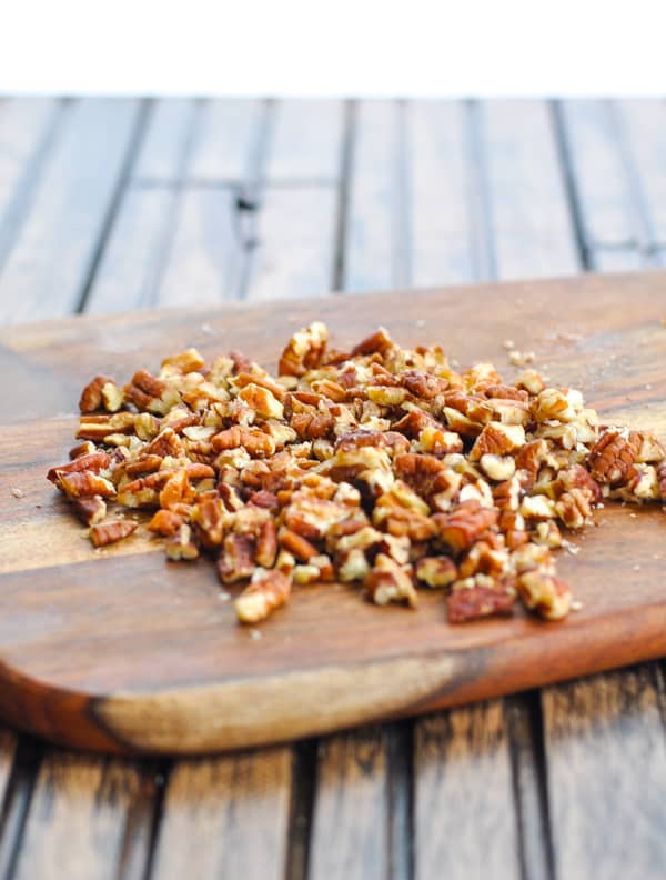 Chopped pecans on a cutting board