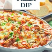 Side shot of a pan of easy pizza dip recipe with text title overlay