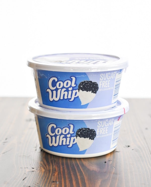 Two stacked containers of Cool Whip