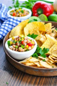 Copper tray of Texas Caviar and chips