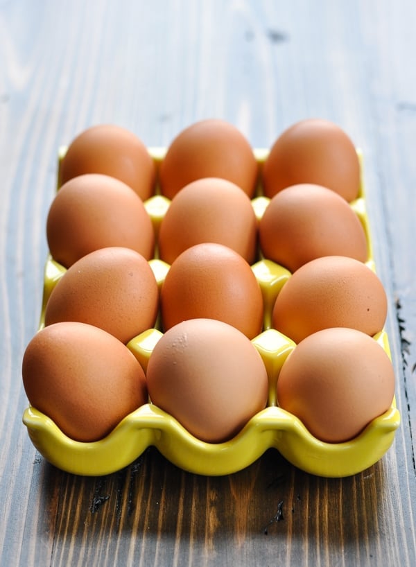 Brown eggs in yellow tray