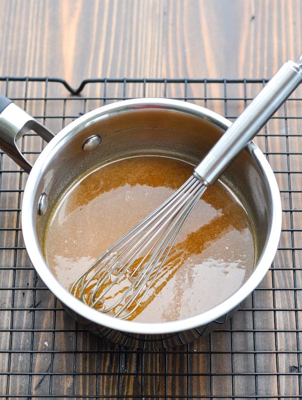 Honey glaze in a saucepan for grilled pork