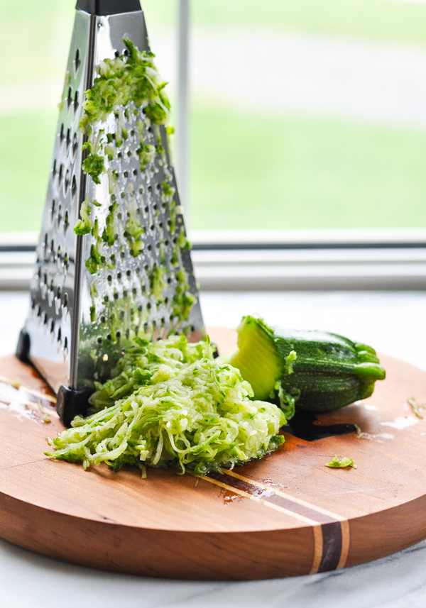 Grated zucchini on a cutting board