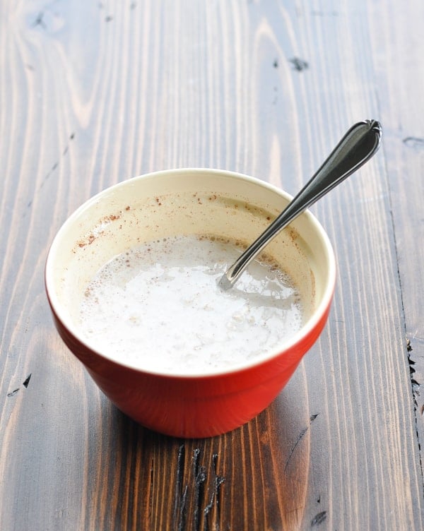 Bowl of oat mixture for overnight oats with Greek yogurt