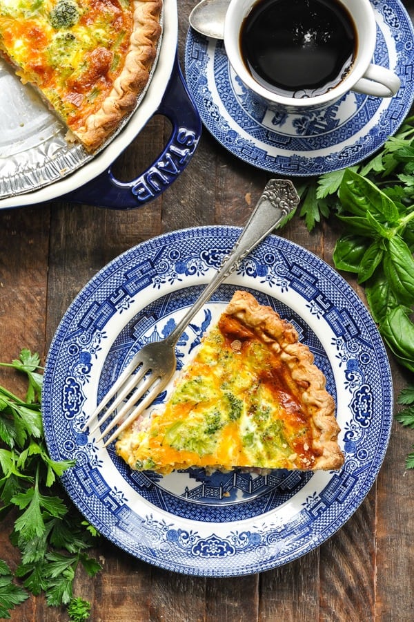 Overhead shot of slice of broccoli quiche on a plate