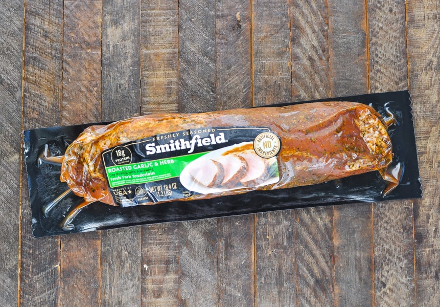Overhead shot of garlic and herb pork tenderloin in package