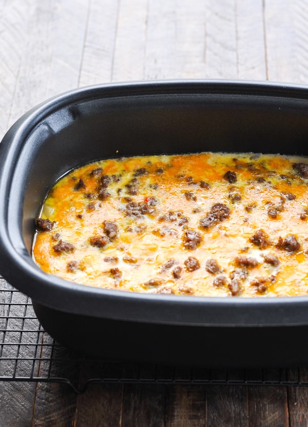 Breakfast casserole in Crock Pot on a cooling rack