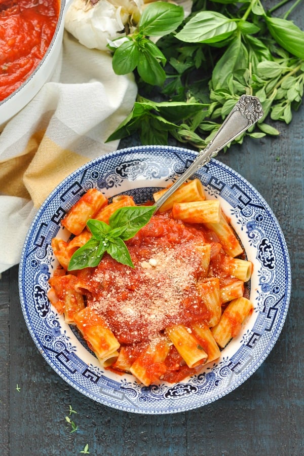 Overhead shot of easy tomato basil marinara sauce served over pasta