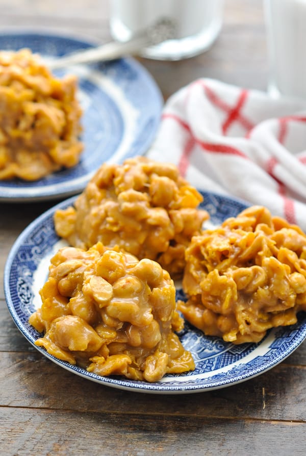 Three no bake peanut butter Corn Flakes Cookies on a plate