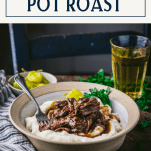 Side shot of a bowl of Mississippi Pot Roast and mashed potatoes with text title box at top