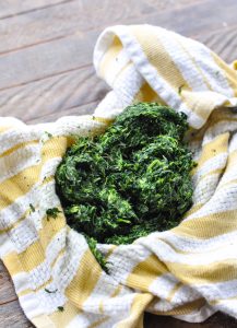 How to squeeze spinach dry in a towel