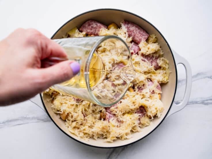 Adding beer to the pan.