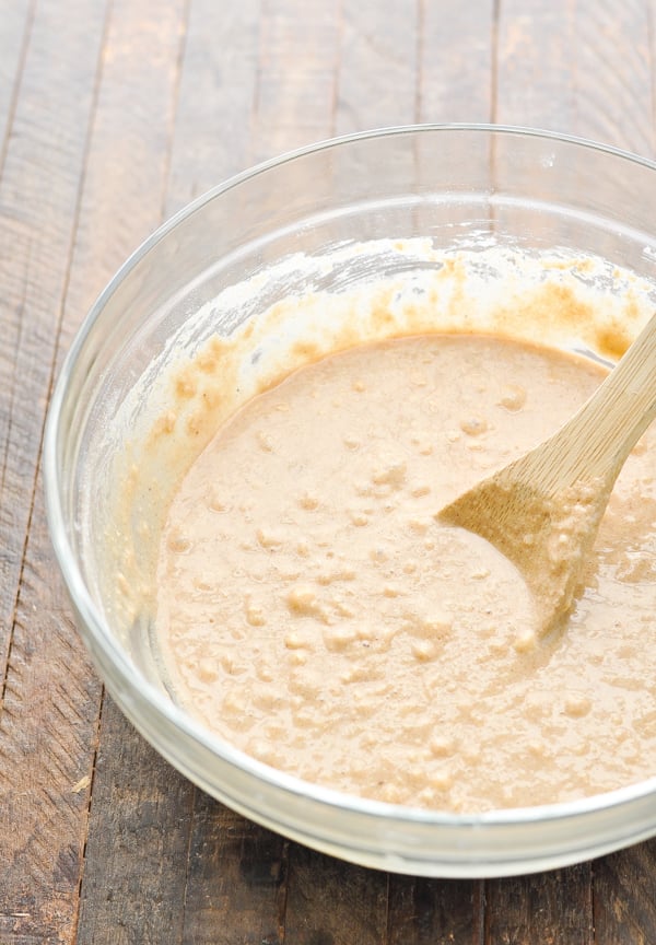 Brown sugar cinnamon muffin batter in a glass mixing bowl