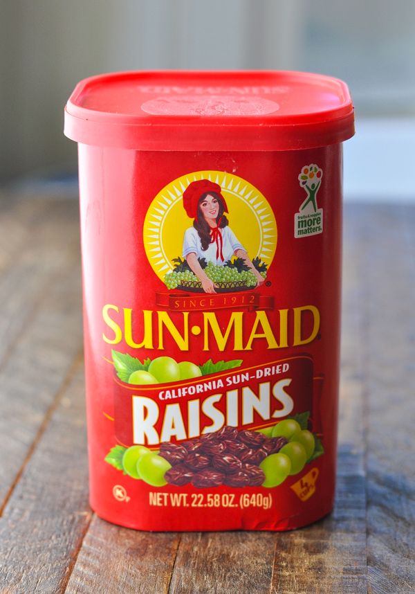 A container of Sun Maid raisins is an essential ingredient in this oatmeal raisin cookies recipe.