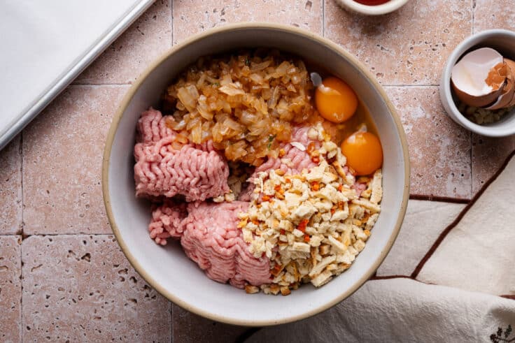 Ground turkey meatloaf mixture in a bowl before combining.