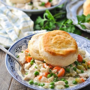 Close front shot of Crock Pot Chicken Pot Pie in a blue and white bowl