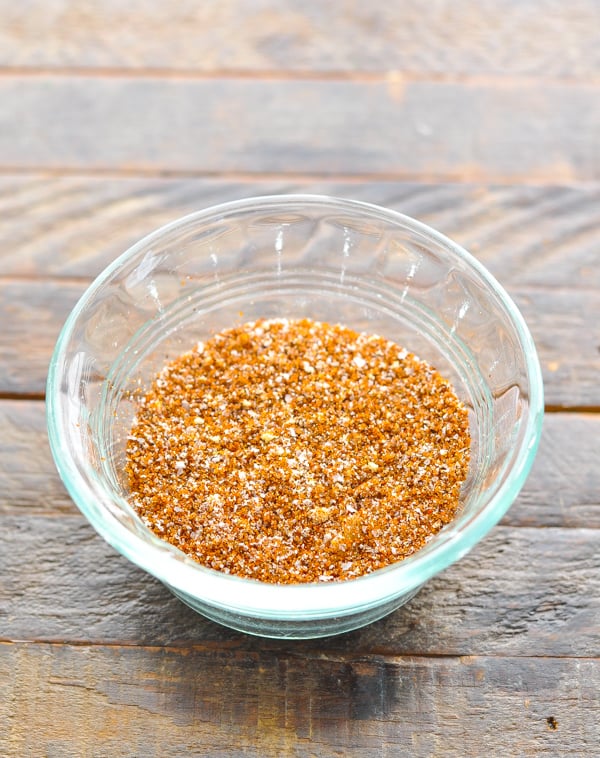 Dry rub for crock pot ribs in a small glass bowl