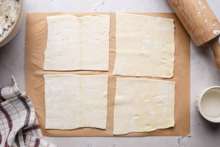 Puff pastry rolled out and cut into squares.