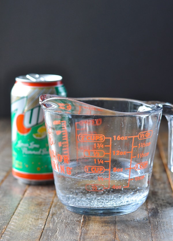 7UP soda in a glass measuring cup for pound cake