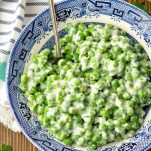 Close up overhead shot of a bowl of old fashioned creamed peas