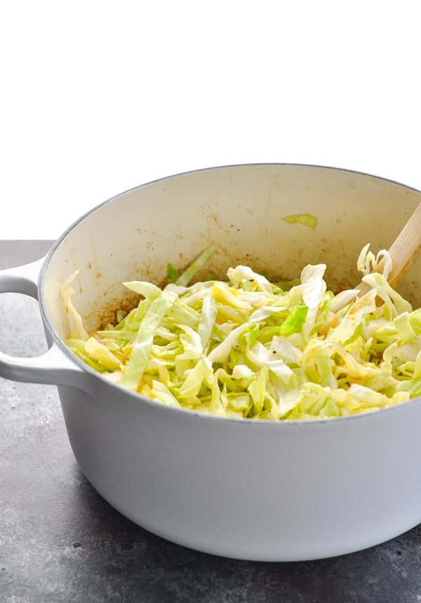 Cabbage in a white dutch oven