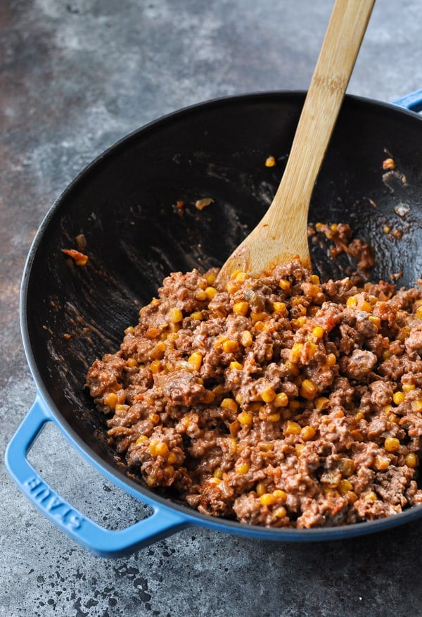 Ground beef mixture in a cast iron skillet