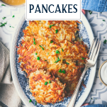 Hands holding a tray of potato pancakes with text title overlay