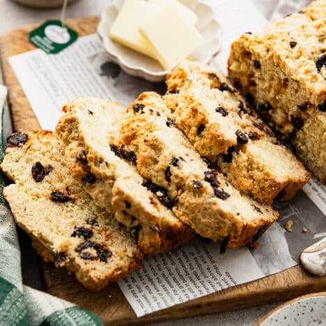 Square close up of a sliced loaf of Irish soda bread.
